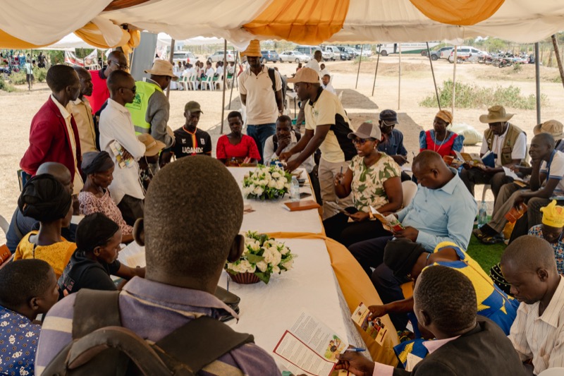 Community gathering under tents at the Eastern Agricultural Show