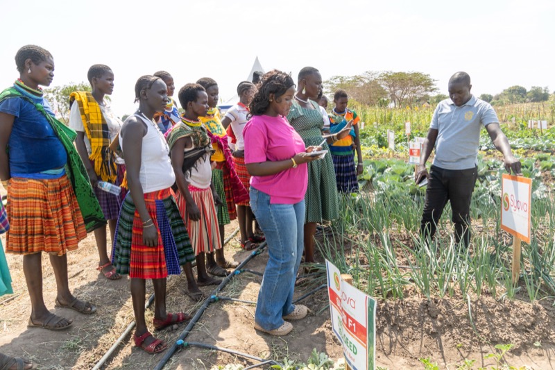 Community members viewing crop demonstrations at the show